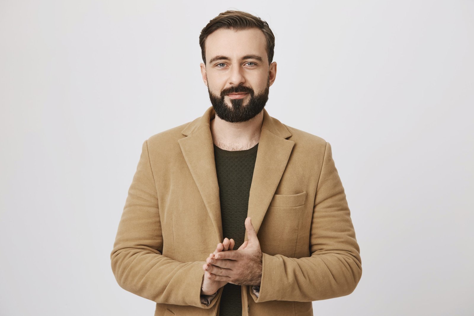 Bearded man wearing tan wool blazer