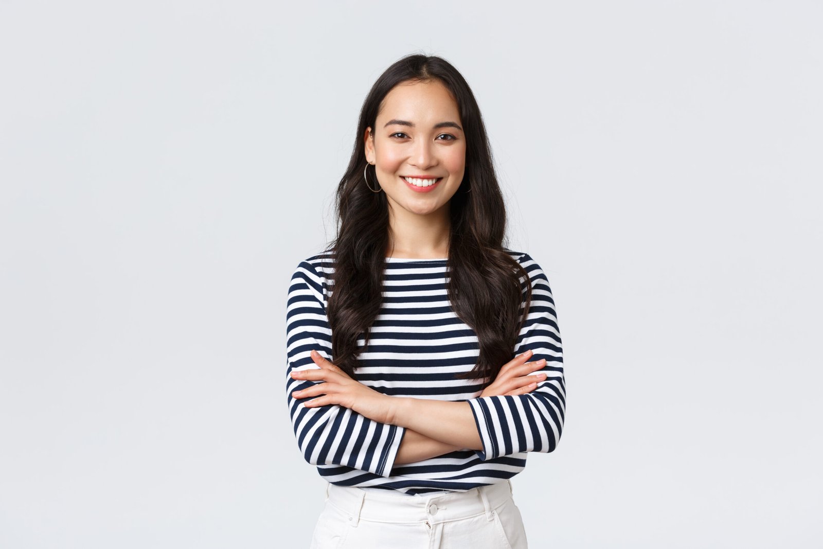 Woman smiling in striped boatneck shirt